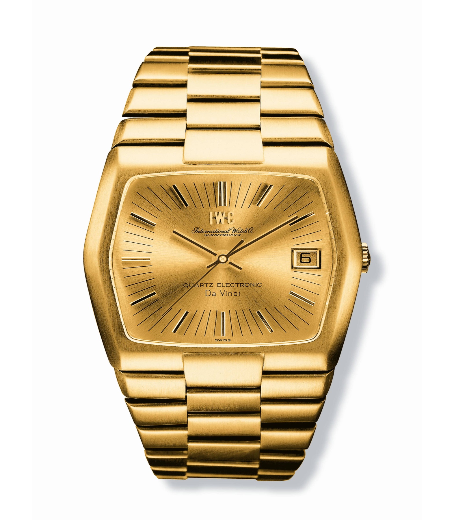 A Da Vinci watch with its distinctive hexagonal gold case housing an early quartz movement, photographed against a dark background